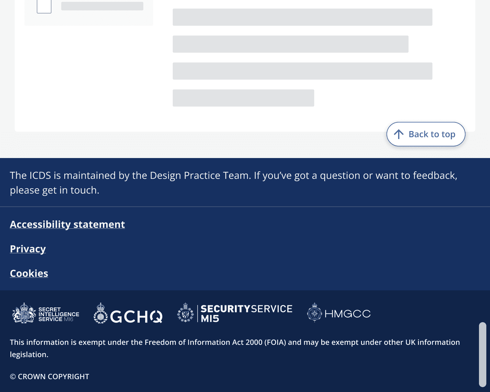 An example page that is scrolled all the way to the bottom showing a footer component with the back to top button positioned above it.