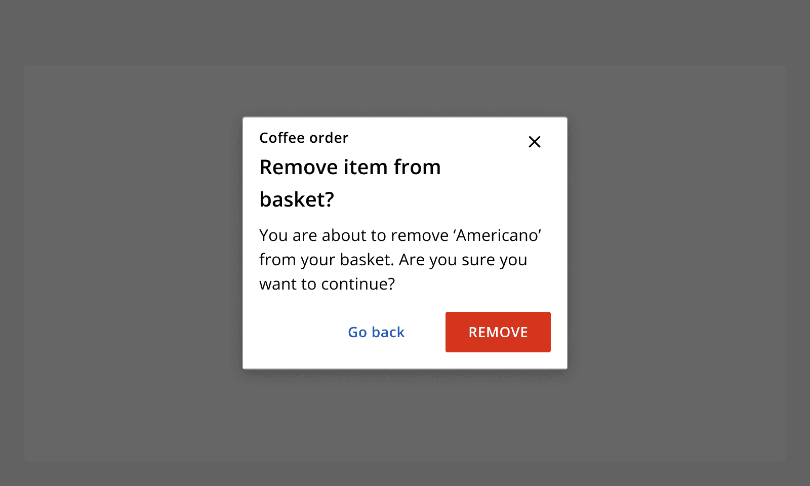 An example dialog for removing an item from a basket. It provides a destructive action button for 'Remove' and a secondary button for 'Go back'.