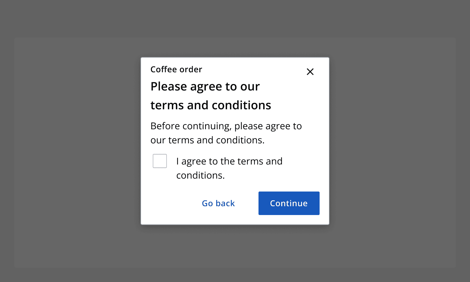 An example dialog for a coffee order that says 'Please agree to our terms and conditions.' The dialog has a checkbox in its content that allows the user to signify agreement. There are two buttons for 'continue' and 'go back'.